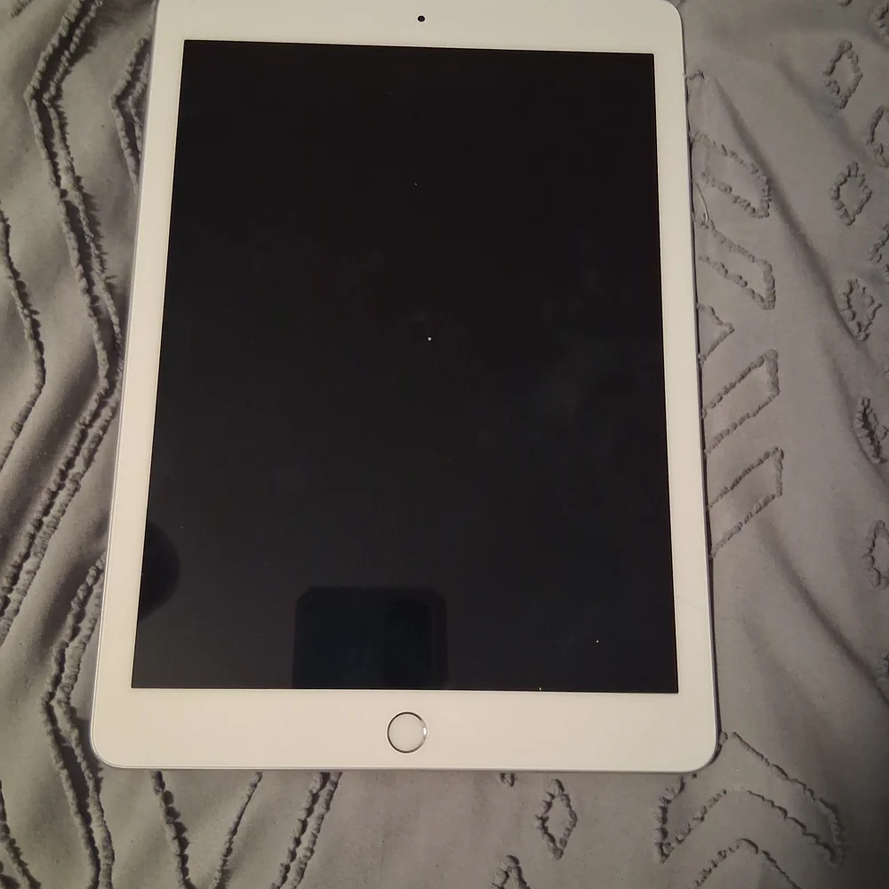 Locked White iPad 6th Generation Tablet
